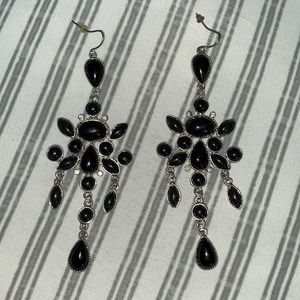 Drippy black chandelier shoulder earrings